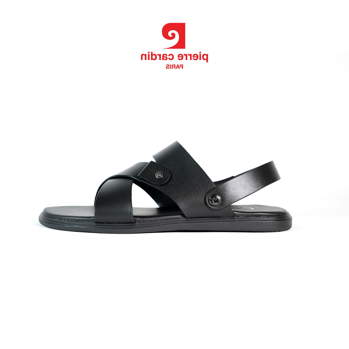 A black leather slide sandal by Pierre Cardin, featuring two wide straps and a single strap with a decorative metal rivet, shown in profile against a white background with the red Pierre Cardin logo at the top.